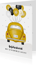 Geslaagd kaart voor rijbewijs met gele kever en ballonnen