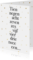 Leuke nieuwjaarskaart met typografie en gouden sterren