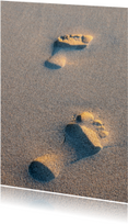 Voetstappen in het zand