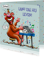Grappige verjaardagskaart met grappige beer met orgeltje