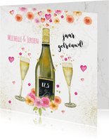 Huwelijksjubileum champagne bloemen