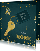 Kerst-verhuiskaart sleutel met label new home
