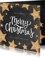 Kerstkaart met houten sterren, Merry Christmas en krijtbord