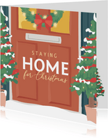 Kerstkaart met illustratie van een voordeur en typografie