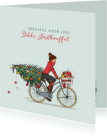 Kerstkaart vrouw met fiets kerstboom