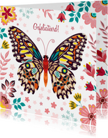 Kleurrijke verjaardagskaart vlinder met bloemen en planten