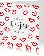 Stijlvolle valentijnskaart met rode kusjes