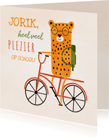 Succes kaart school met luipaardje op rode fiets