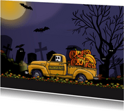 Halloweenkaart auto met pompoen