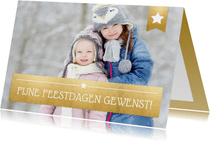 Kerstkaart met een eigen foto en een gouden vlak met letters