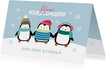 Kerstkaart pinguïns in de sneeuw