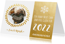 Neujahrskarte mit rundem Foto und Jahreszahl