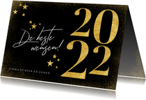 Nieuwjaarskaart in goud 2022 en sterren zwart stijlvol