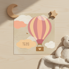 Geboortekaartje een roze luchtballon 