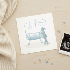 Geboortekaartje jongen met grote zus bij rotan wiegje