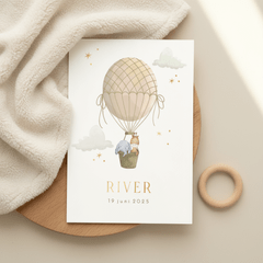 Geboortekaartje luchtballon met wolken en olifant en giraf