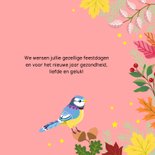 Vrolijke kerstkaart met vogel en planten en bloemen 3