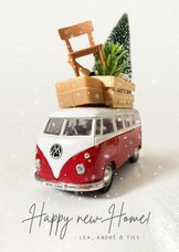 Kerst verhuiskaart met Volkswagen busje en spullen op dak
