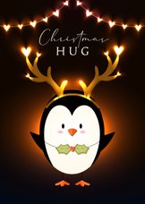 Kerstkaart lief vrolijk knuffel lichtgevende hartjes pinguïn