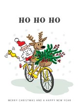 Kerstman met rendier op de fiets