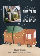 Kerstverhuiskaart happy new year new home met vrachtauto