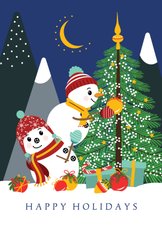 Twee vrolijke sneeuwpoppen versieren de kerstboom
