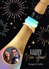 Vrolijke nieuwjaarskaart foto en champagne