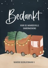 Zakelijke kerstkaart met vrachtwagen en lichtjes in donker