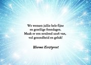 Kerstkaart blauwe kerstbal in licht 2026 3