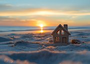 Verhuiskaart zandhuisje op het strand 2