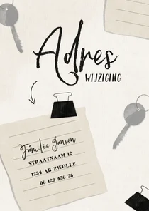 Adreswijziging papiertje met sleutels