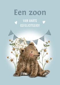 Felicitatie geboorte zoon met beertje tussen de bloemen