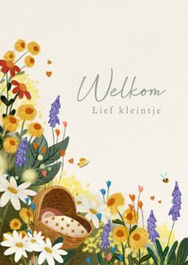 Felicitatiekaart geboorte met kleurrijke bloemen en wiegje