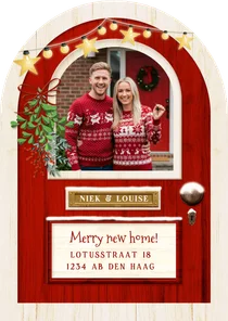 Grappige kerst verhuiskaart met rode deur in boogvorm
