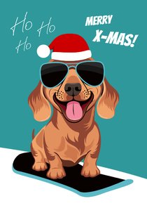 Grappige kerstkaart met stoere teckel op snowboard