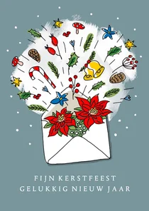 Kerstgroet in een envelop door de brievenbus