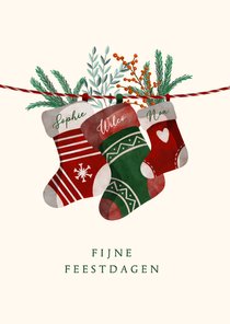 Kerstkaart drie kerstsokken met namen en twijgjes