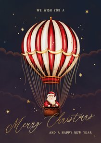 Kerstkaart kerstman in een luchtballon met sterren