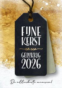Kerstkaart label 2026 op goud en sneeuw
