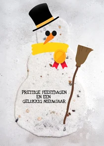 Kerstkaart met een sneeuwpop met bezem