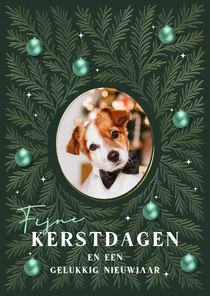 Kerstkaart met foto en groene dennentakken