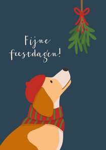 Kerstkaart met hond en maretak