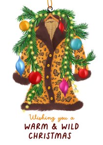 Kerstkaart met warme kerstjas en kersttakken