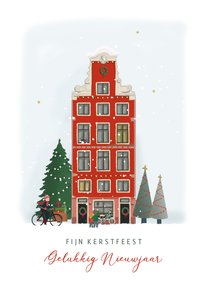 Kerstkaart stadshuis met kerstbomen