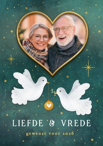 Kerstkaart vrede en liefde met vredesduif en foto in hartje