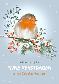 Kerstkaart winters roodborstje met kerstgroen