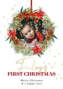 Klassieke kerstkaart eerste kerst botanisch krans foto
