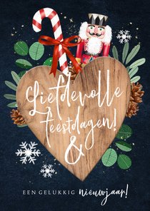 Liefdevolle kerstkaart kerst elementen notenkraker hart ster