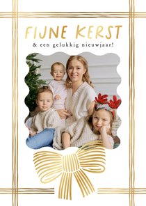 Minimalistische kerstkaart lint strik lijntekening goud foto