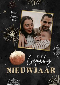 Nieuwjaarskaart oliebol vuurwerk sterretje foto